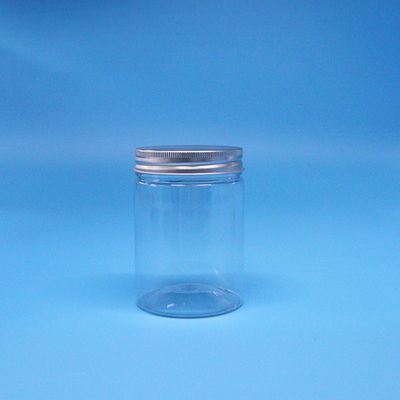 Caramelo transparente PET de qualidade alimentar cilindro vazio frasco de alimentos redondo tampa superior de parafuso