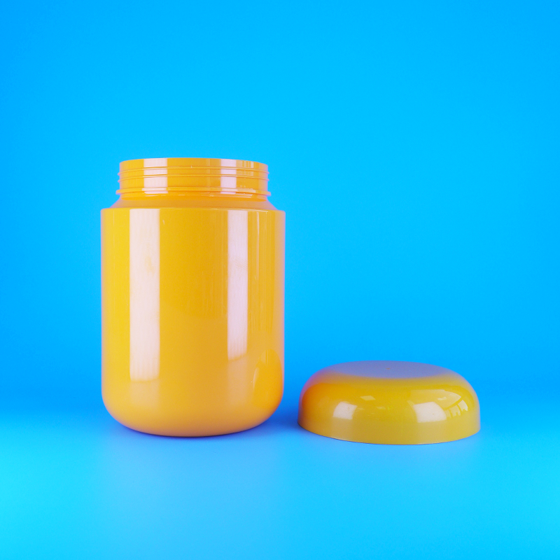 Frascos de doces de plástico PET laranja de qualidade alimentar com tampa plana de rosca laranja em formato redondo